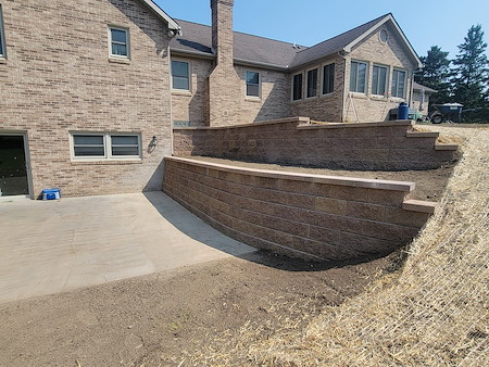 Retaining Wall Repair vs. Replacement: What Canton Homeowners Should Know This Winter